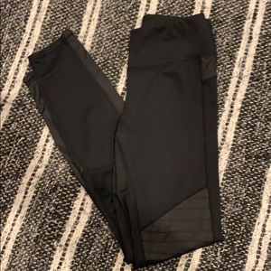 Black Kyodan leggings with moto style design.
